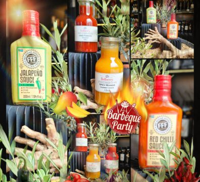 Diverse Grillsaucen mit Olivenzweige dekoriert